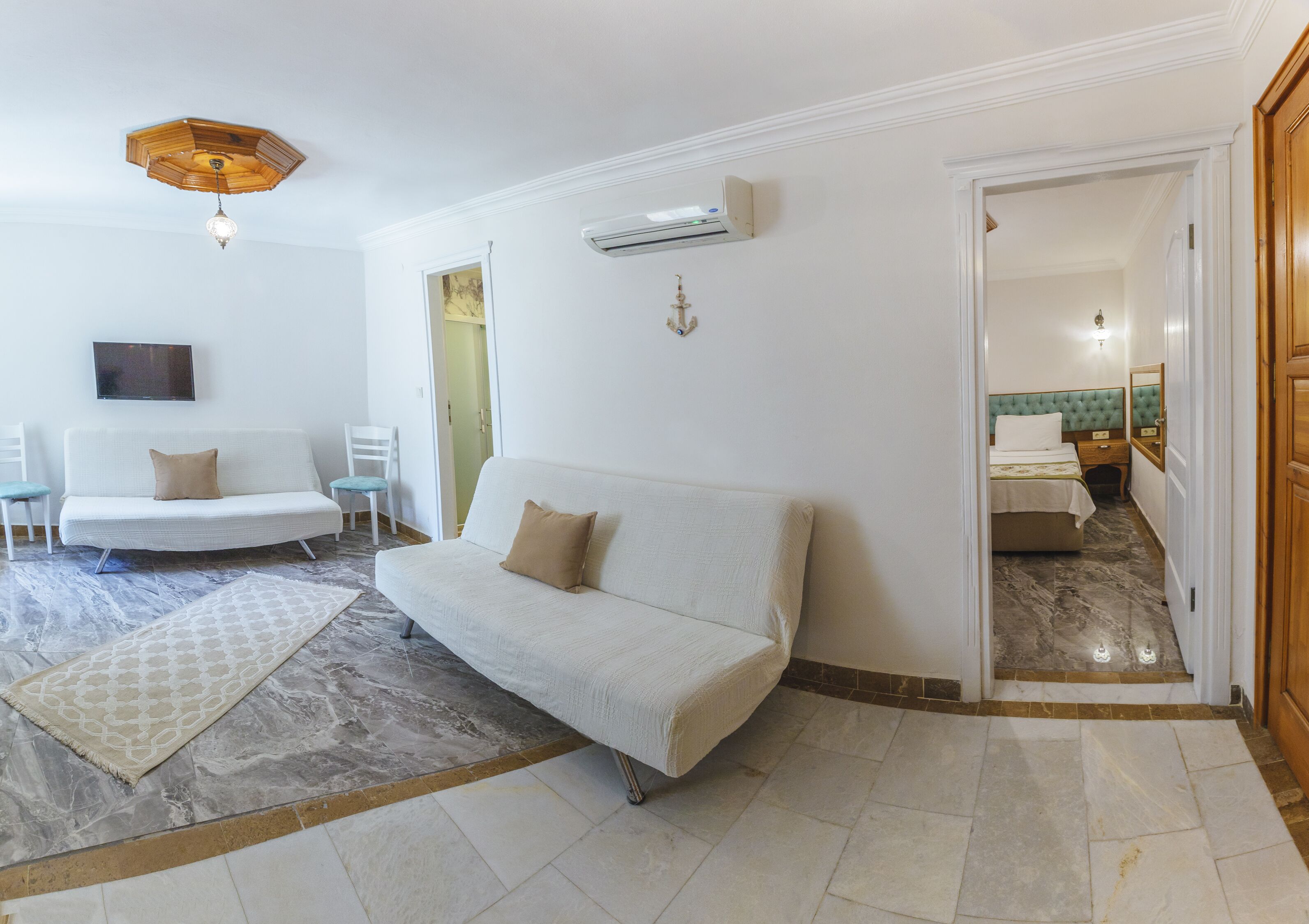family suite | living area | 32-inch lcd tv with satellite channels, tv
