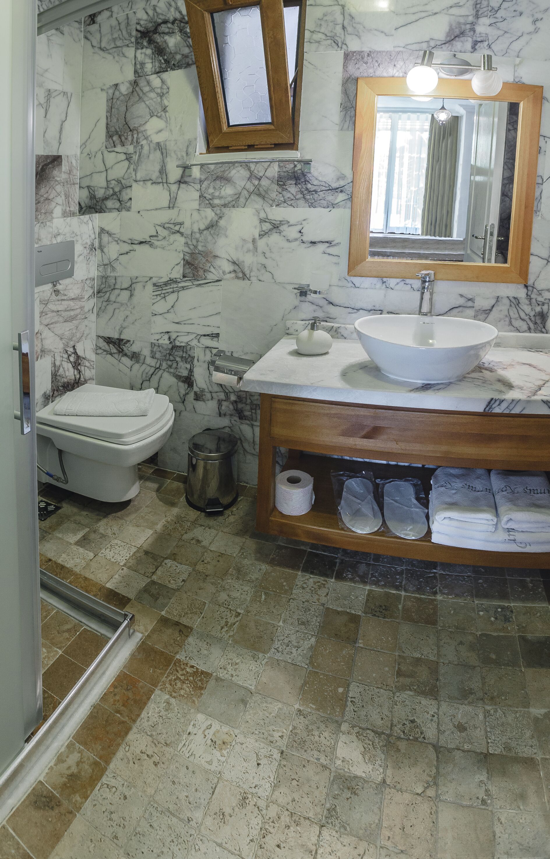 family suite | bathroom | shower, rainfall showerhead, free toiletries, hair dryer