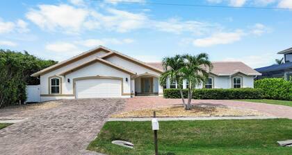 Pet-friendly waterfront home steps to beach/pool