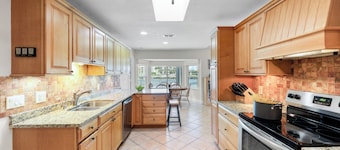 Pet-friendly waterfront home steps to beach/pool