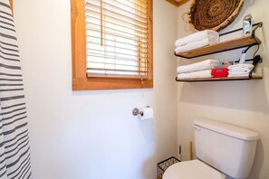 Hair dryer, towels, soap, shampoo