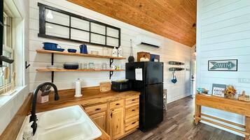 Fridge, microwave, coffee/tea maker, toaster