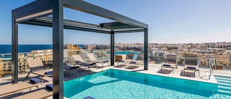 Outdoor pool, pool umbrellas, pool loungers