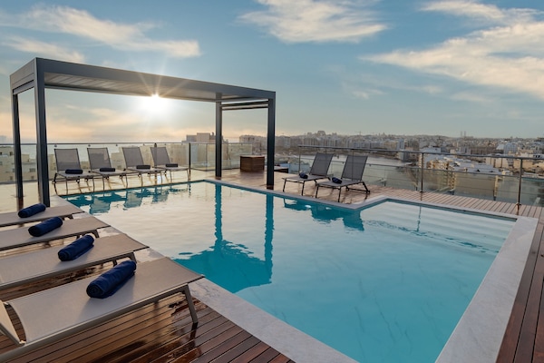 Outdoor pool, pool umbrellas, pool loungers