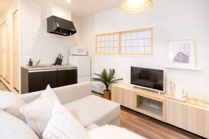 Studio Supérieur | Coin cuisine privé | Réfrigérateur, micro-ondes, plaque de cuisson, bouilloire électrique