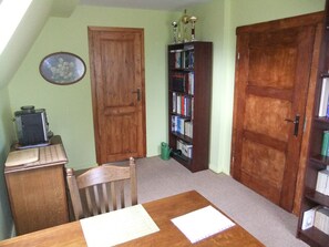 Apartment, 1 Bedroom, Garden View | Living area | Books - If you Want to Explore Lower Silesia, Sunny Apartment is the Perfect Location (Sobotka)
