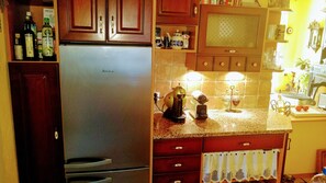 Apartment, 1 Bedroom, Fireplace, Garden View | Private kitchen | Microwave, coffee/tea maker, toaster, dining tables