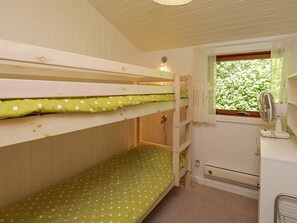 A bunk bed room with a window and a fan. - 4 Star Holiday Home in Idestrup (Idestrup)