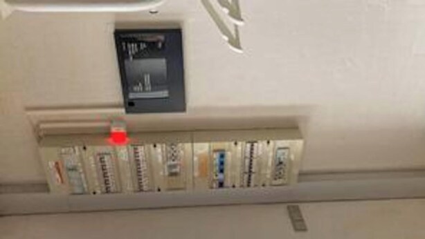 A control panel with various switches and indicators, likely for hotel room amenities. - 4 Star Holiday Home in Ringkobing (Ringkobing)