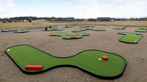A miniature golf course with multiple holes and a clear sky. - 10 Person Holiday Home in Brovst (Brovst)