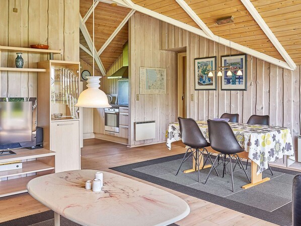 Enjoy dining and cooking in this well-appointed room with a dining area and kitchen.