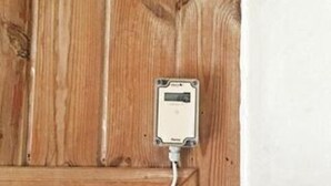 A utility meter mounted on a wooden wall. - 4 Star Holiday Home in Vejers Strand (Vejers Strand)
