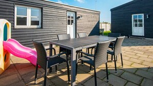 Outdoor dining - 6 Person Holiday Home in Juelsminde (Juelsminde)