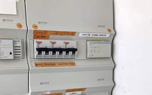 A control panel with various switches and labels, including 'ALARM' and 'VAN HOUTEN.' - 4 Star Holiday Home in Hemmet (Hemmet)