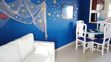 Apartment, 2 Bedrooms, Smoking, Balcony | Living room | TV