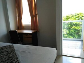 Apartment, 1 Bedroom, Terrace | 1 bedroom, iron/ironing board, bed sheets - 1br Apartment With Pool (Depok)