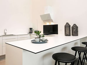 Appartement | Cuisine privée | Chaise haute