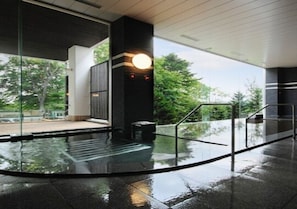 Enjoy the elevated view from the dry platform, where a bench offers a comfortable spot to take in the surroundings.