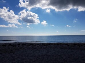 A beach with a clear sky and ocean. - 4 Star Holiday Home in Vaeggerlose (Vaeggerlose)