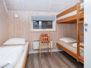 A room with bunk beds, a desk, and a window. - 9 Person Holiday Home in Hemmet (Hemmet)