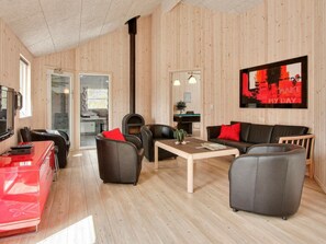 House | Living area | Flat-screen TV, foosball, stereo, offices