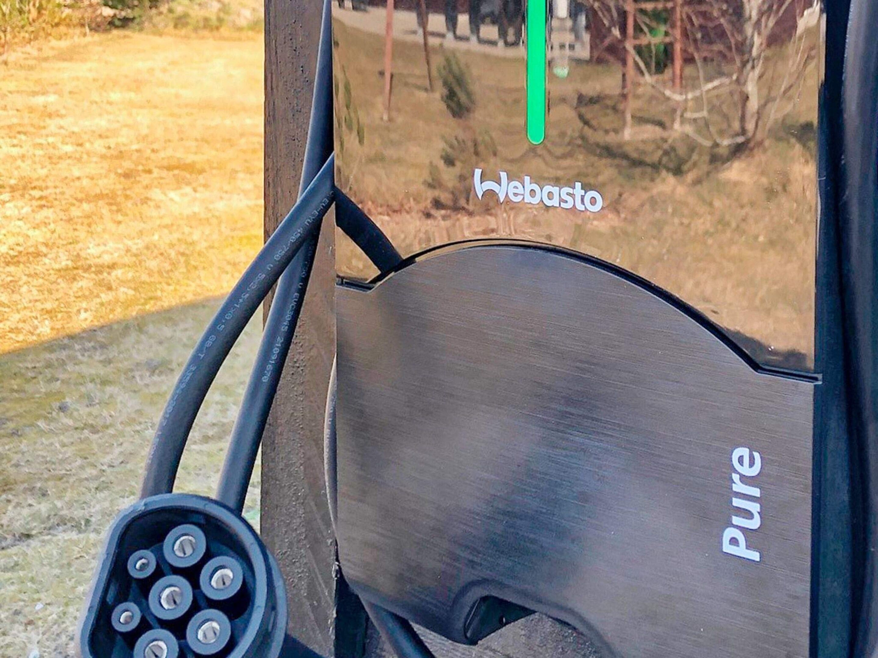 A close-up of a vehicle's interior with the brand name 'Webasto' and the word 'Pure' visible.
