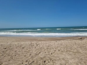 A sandy beach with waves, clear sky, and no visible structures. - 4 Star Holiday Home in Harboore (Harboore)