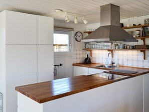 House | Private kitchen | Fridge, stovetop, dishwasher, coffee/tea maker - Modern Holiday Home With Large Terrace in Fanø (Fano)