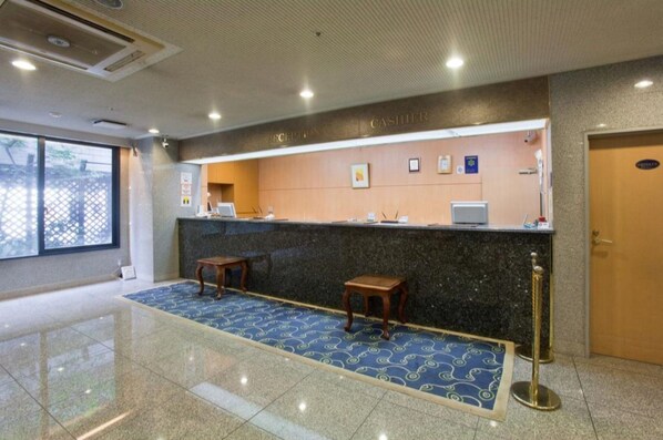 Welcome to the hotel reception area, where friendly staff are available to assist with check-in and answer any questions.