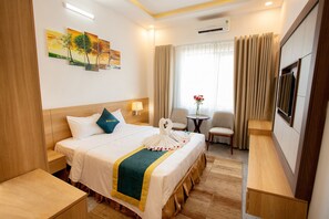 Habitación estándar | Ropa de cama de alta calidad, camas con pillow-top y minibar 