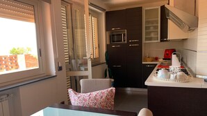 Panoramic Apartment, 1 Bedroom | Private kitchenette | Espresso maker, coffee/tea maker, shared microwave, electric kettle - Miss Emily Vesuvio B&B (San Sebastiano al Vesuvio)