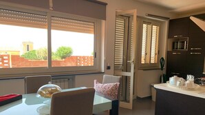 Panoramic Apartment, 1 Bedroom | Living area | Flat-screen TV - Miss Emily Vesuvio B&B (San Sebastiano al Vesuvio)