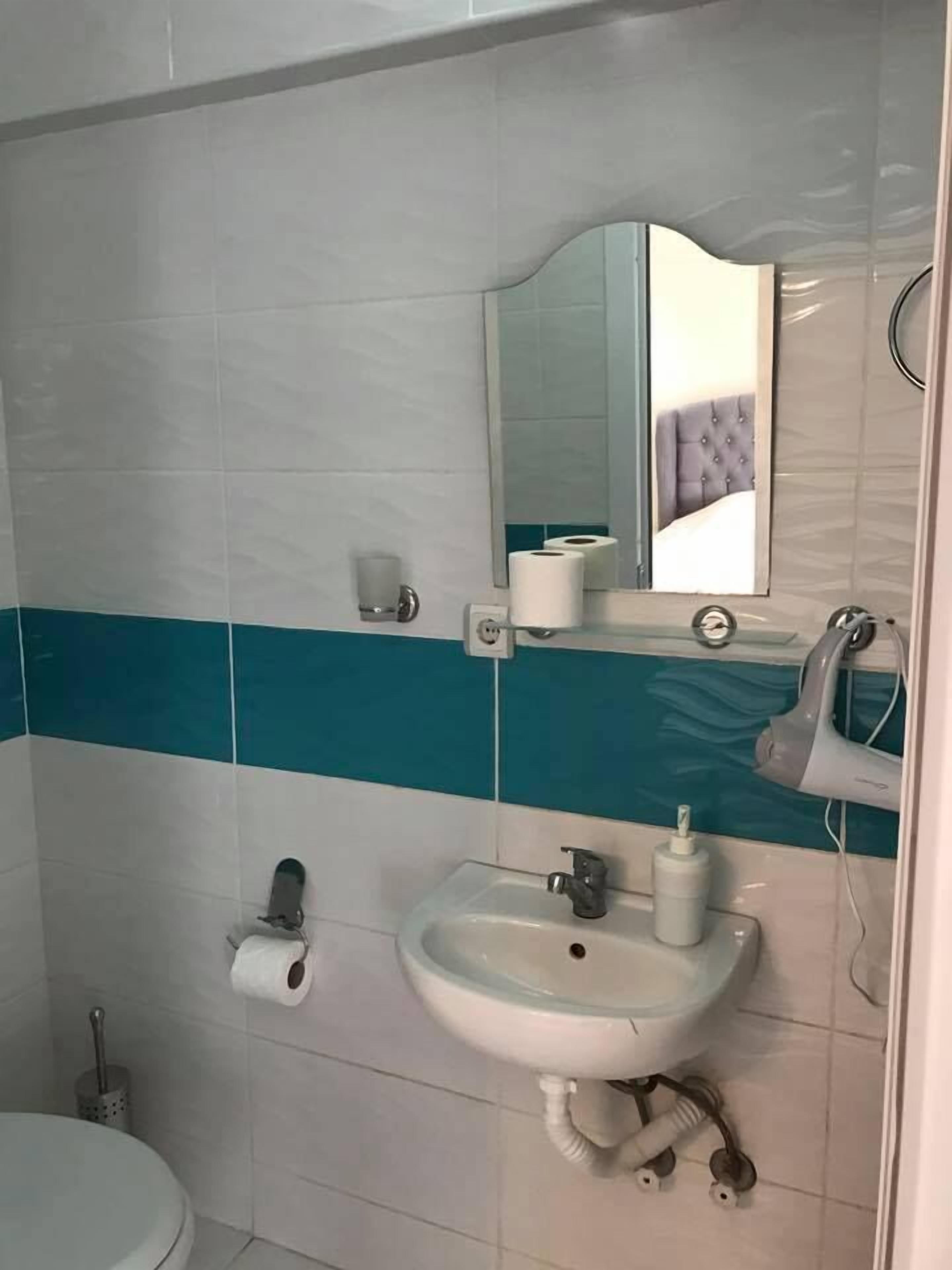 Standard Double Room, Balcony | Bathroom | Shower, free toiletries, hair dryer, towels