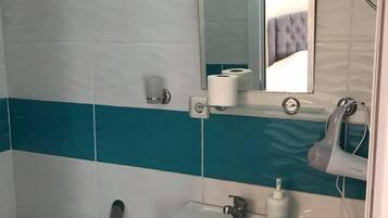 Standard Double Room, Balcony | Bathroom | Shower, free toiletries, hair dryer, towels