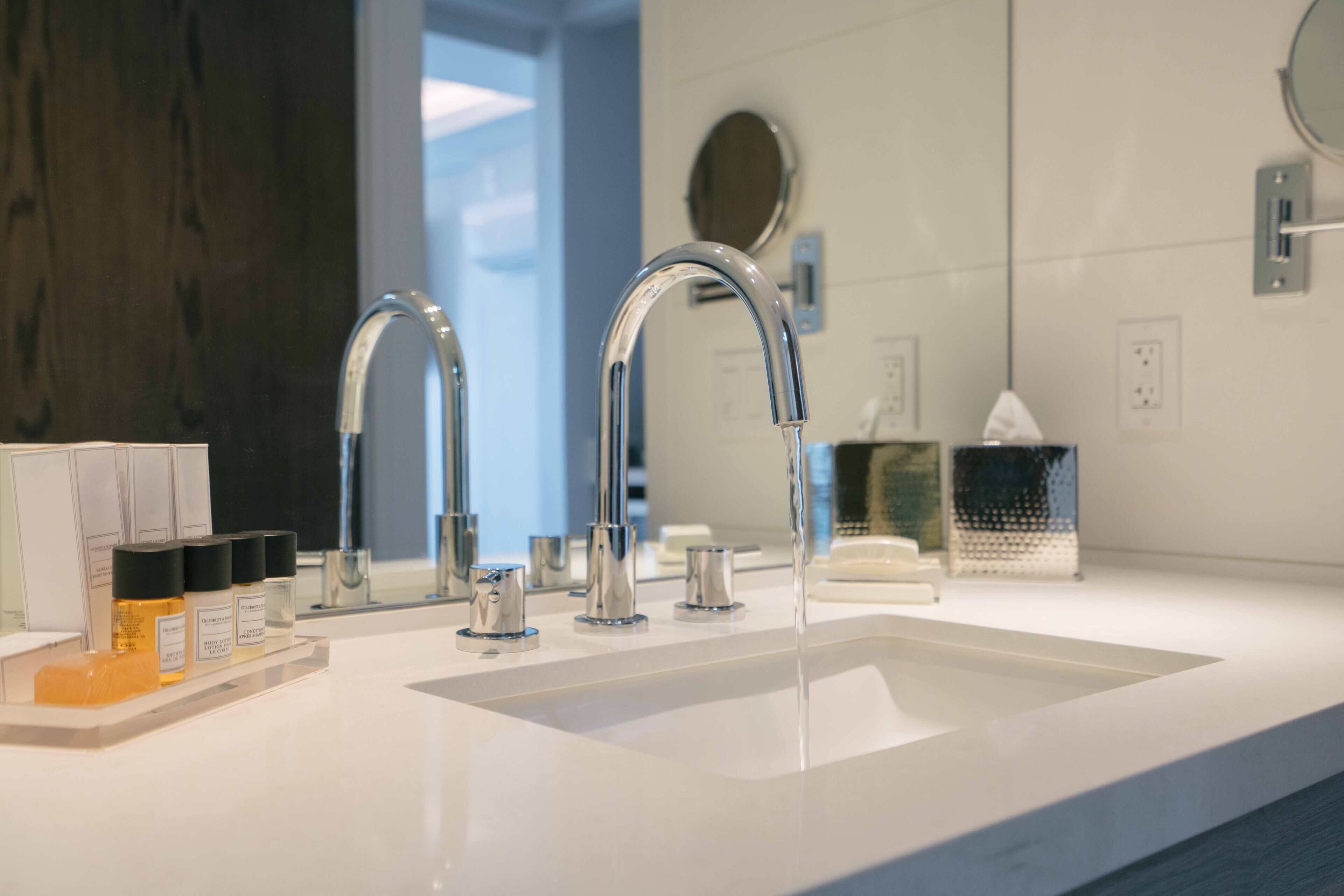 combined shower/bathtub, designer toiletries, hair dryer, dressing gowns