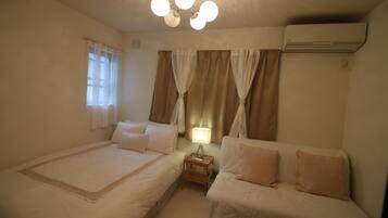 3 bedrooms, down comforters, individually furnished, desk