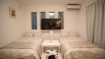 50-inch flat-screen TV with cable channels, TV, DVD player