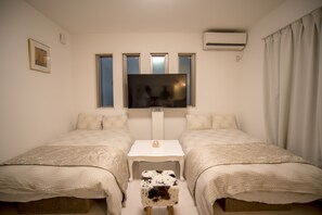 50-inch flat-screen TV with cable channels, TV, DVD player - COCO Shinjuku (Tokyo)