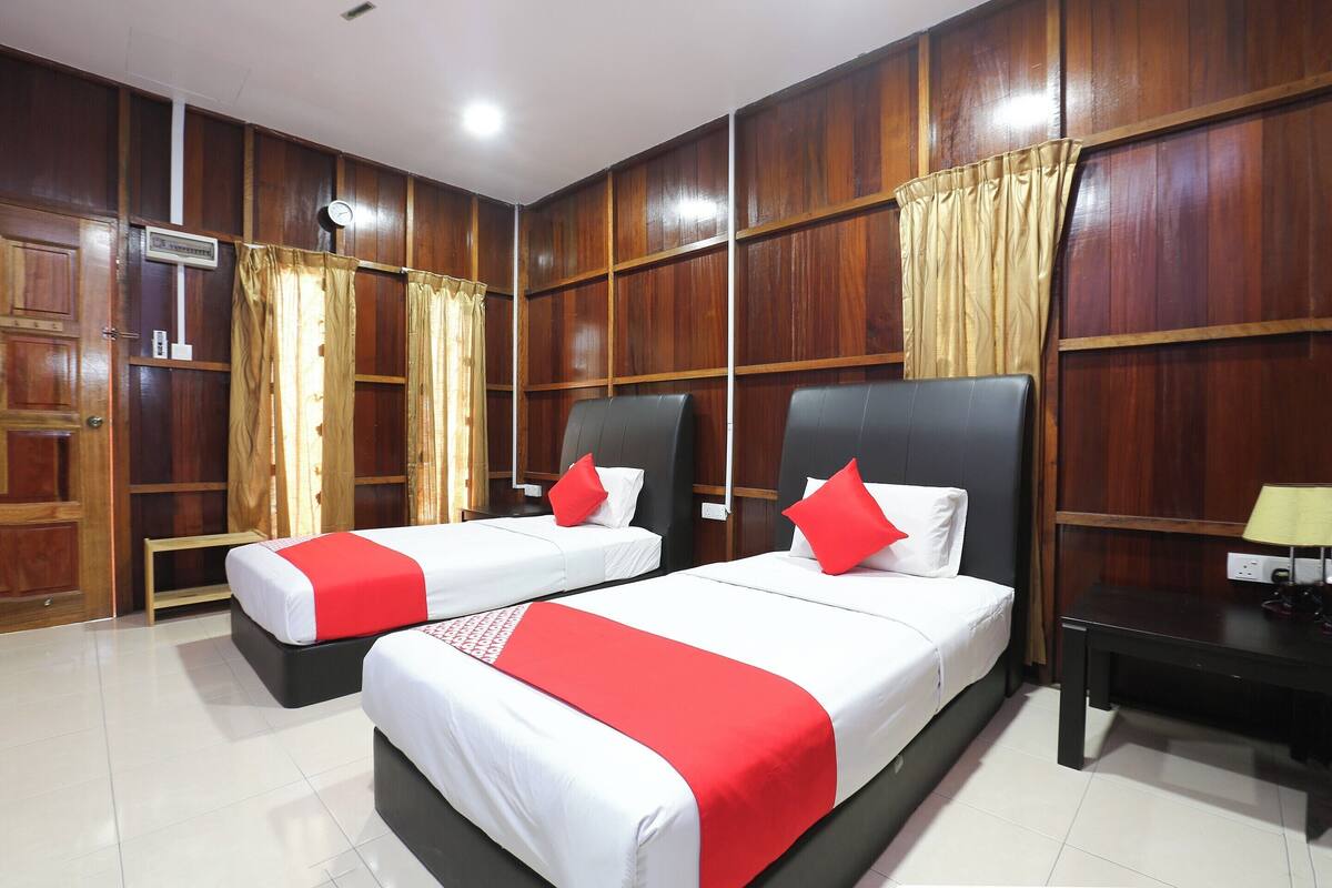 Habitación Deluxe con 2 camas individuales | Wifi gratis y ropa de cama 
