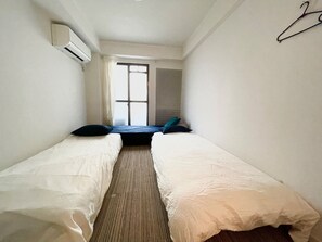 1 dormitorio, tabla de planchar con plancha, wifi gratis y ropa de cama