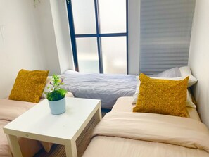 1 dormitorio, tabla de planchar con plancha, wifi gratis y ropa de cama