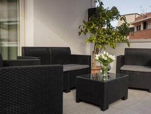 Chambre triple Deluxe | Terrasse/patio