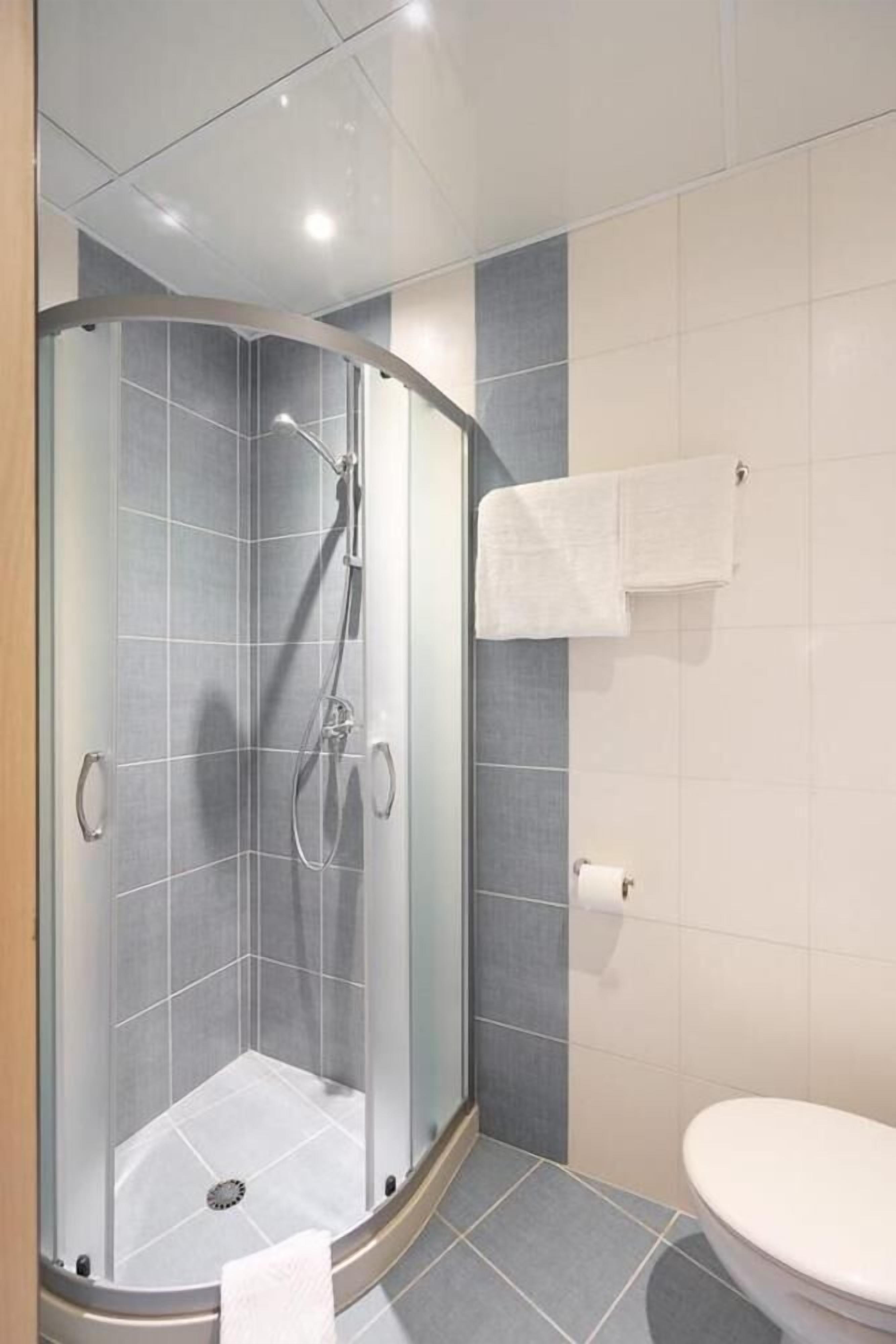 shower, free toiletries, hair dryer, slippers