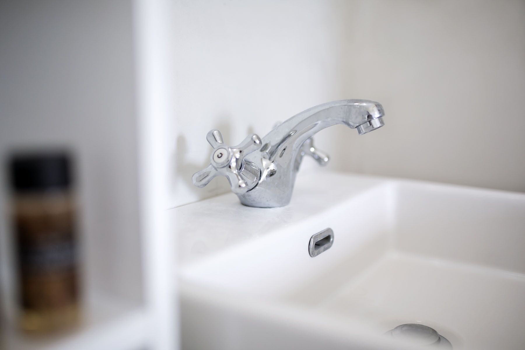 A bathroom sink with a modern faucet.