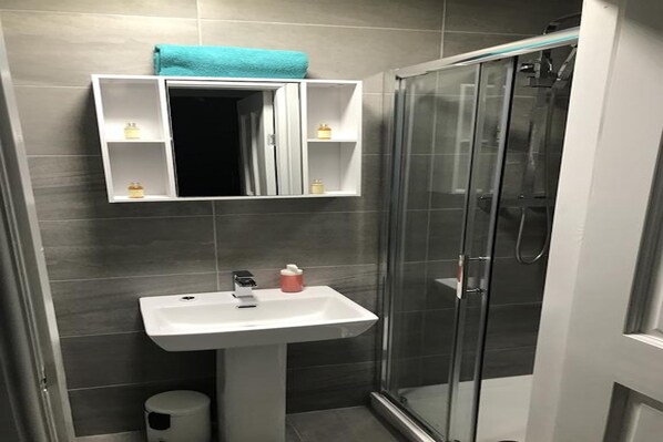 Shower, free toiletries, hair dryer, towels