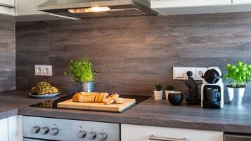 Luxury Apartment | Private kitchen | Full-size fridge, oven, stovetop, dishwasher