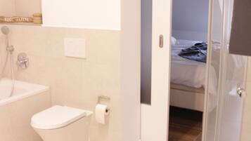 Luxury Apartment | Bathroom amenities | Free toiletries, hair dryer, heated floors, towels