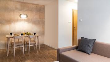 Apartment, 2 Bedrooms | Living area | Flat-screen TV