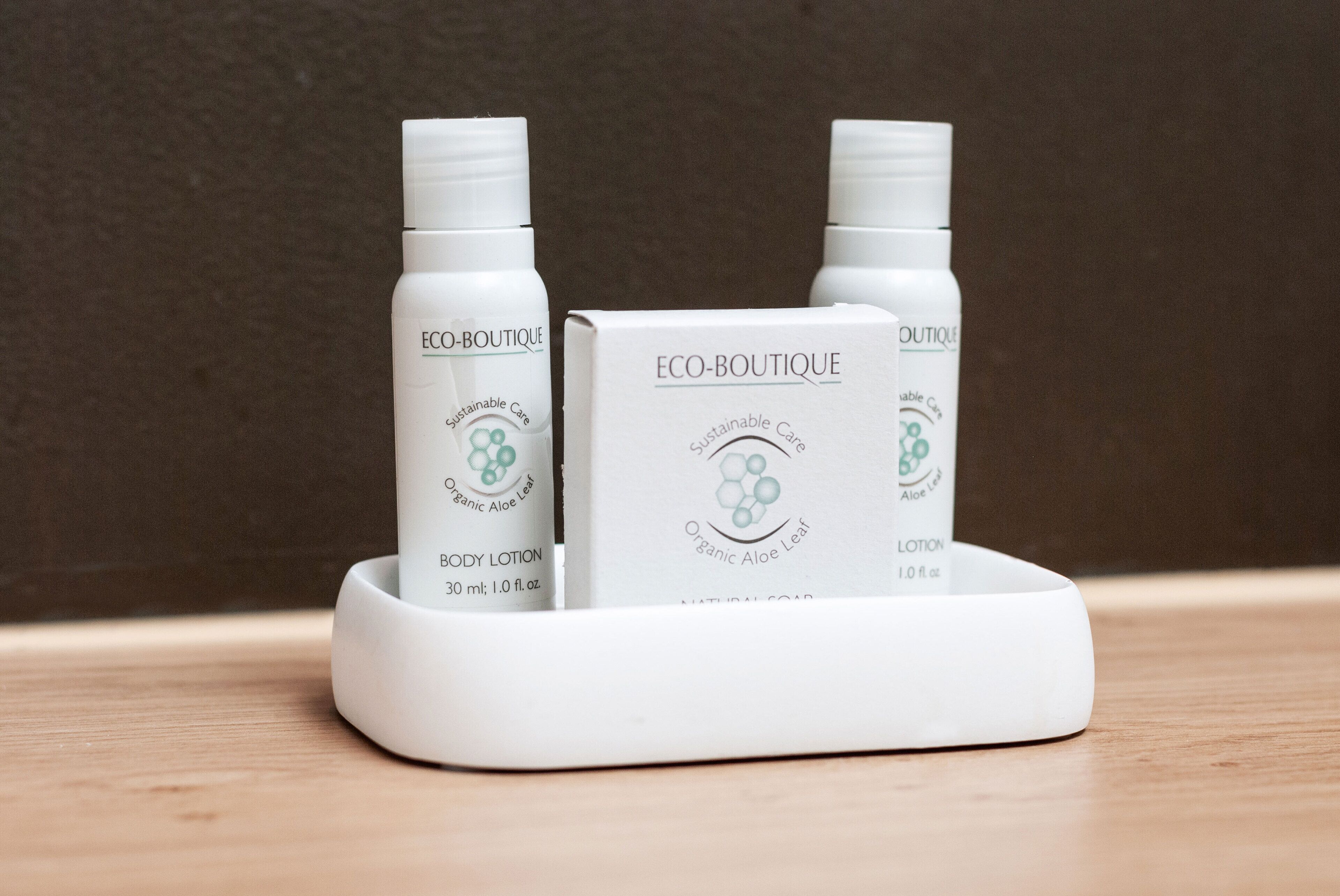 eco-friendly toiletries, hair dryer, bathrobes, slippers