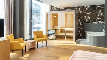 Exclusive Studio Suite (with Private Sauna) | Living area | Flat-screen TV